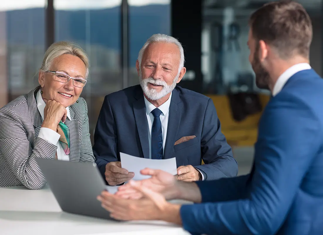 Contact-Couple-Consulting-With-Insurance-Agent